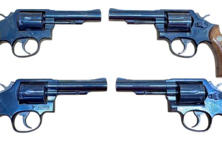 Smith & Wesson Model 10-10 Wood grips, blued, 4" heavy barrel .38Spl Excellent condition