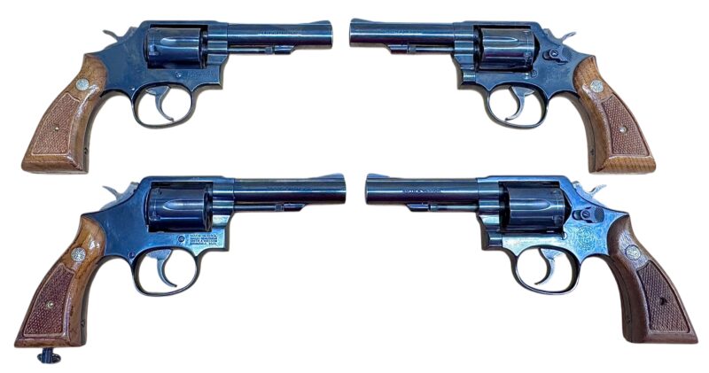 Smith & Wesson Model 10-10 Wood grips, blued, 4" heavy barrel .38Spl Excellent condition