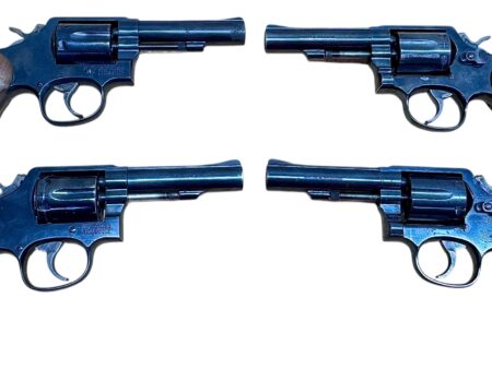 Smith & Wesson Model 10-10 Wood grips, blued, 4" heavy barrel .38Spl VG condition
