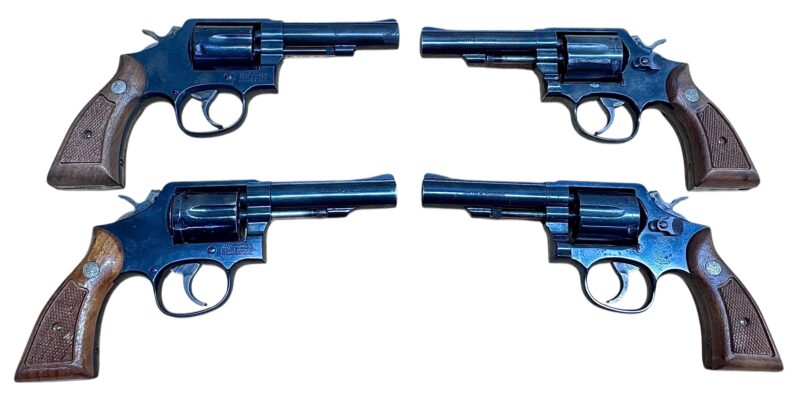 Smith & Wesson Model 10-10 Wood grips, blued, 4" heavy barrel .38Spl VG condition
