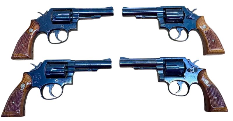 Smith & Wesson Model 10-8 Wood grips, blued, 4" heavy barrel .38Spl Excellent condition
