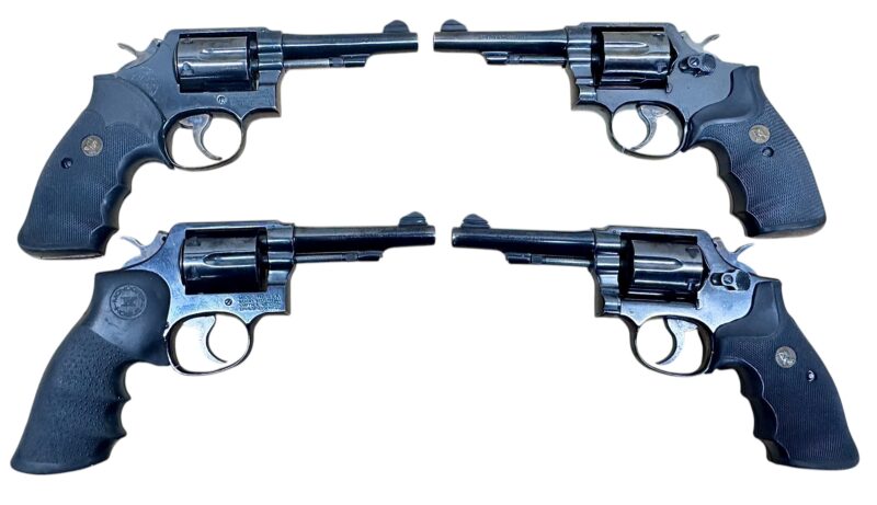 Smith & Wesson Model 10-7 Polymer grips, blued, 4" barrel .38Spl EX condition