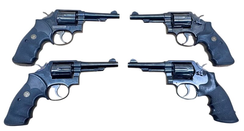 Smith & Wesson Model 10-7 Polymer grips, blued, 4" barrel .38Spl VG-EX condition