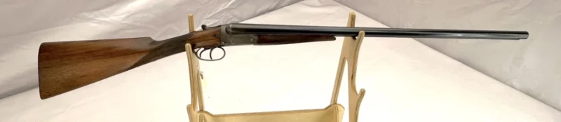 side by side 12ga shotgun British W. Cox and Sons Extractor Boxlock SN 2025