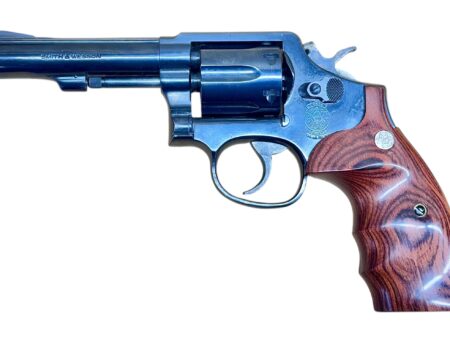 Smith & Wesson Model 10-8 Wood Target grips, blued, 4" heavy barrel .38Spl Excellent condition